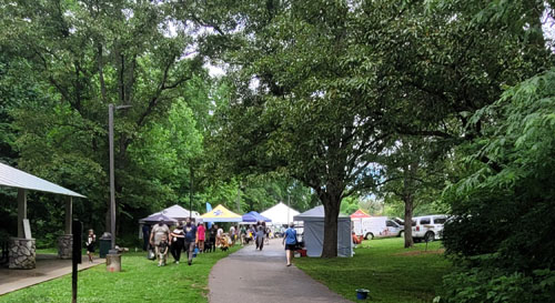 looking towards the main lot, path lined with booths
